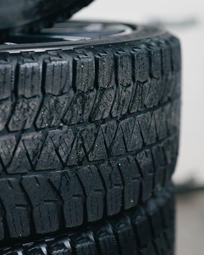 Racks of new and used tires at the Boss Tire shop