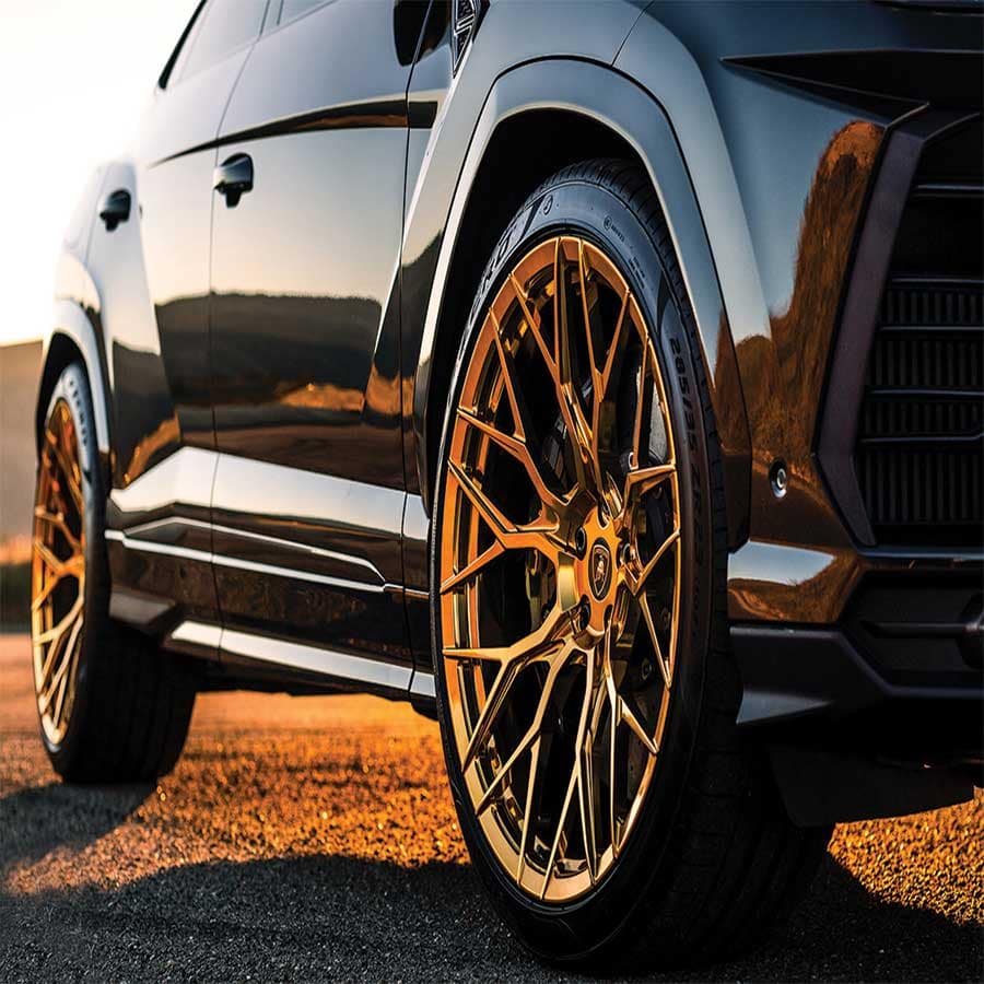 A close-up of a wheel and tire on an SUV