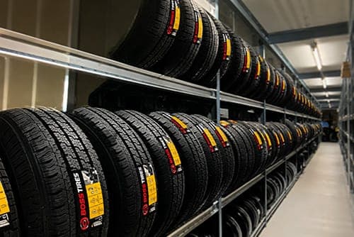 A rack of Boss Tires in stock at the shop
