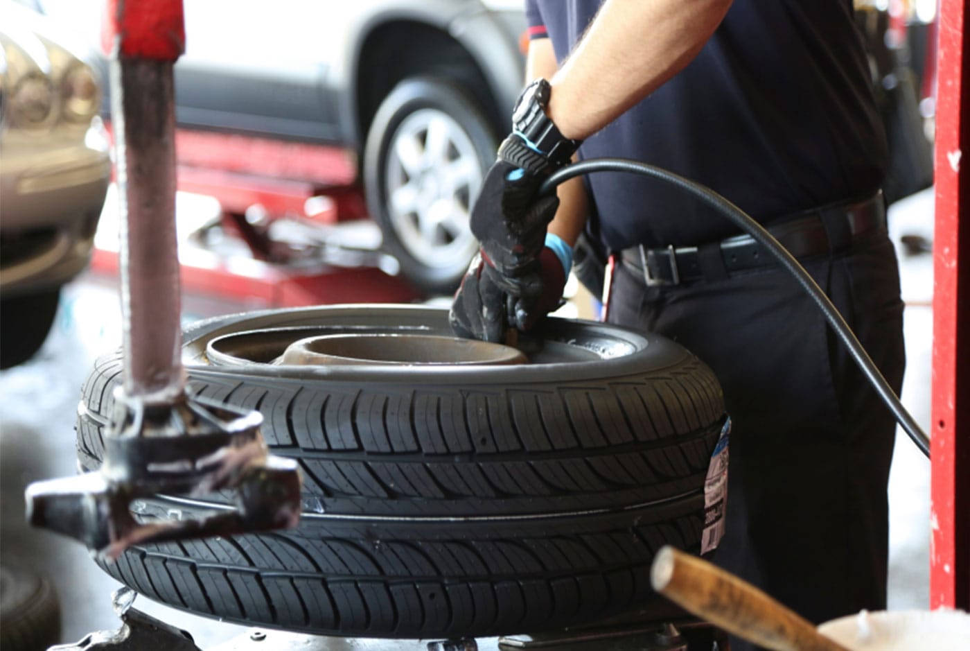 A four-wheel alignment being performed at Boss Tire